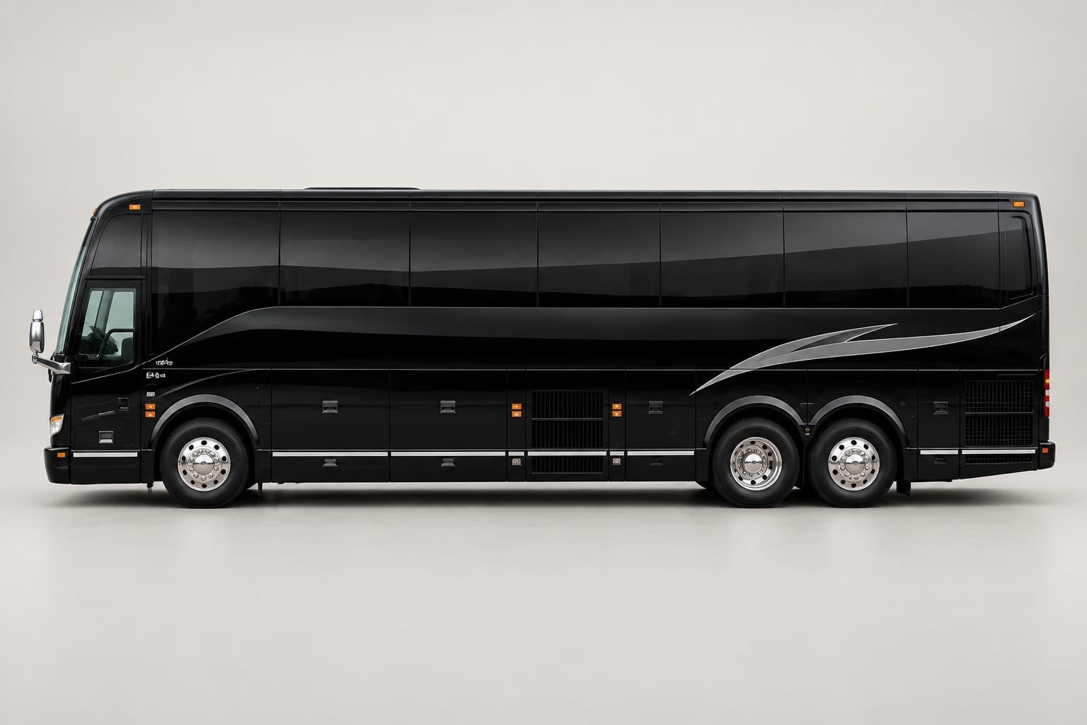Black touring coach in side profile on a neutral studio background